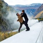 Mission Impossible Dead Reckoning promo shot of fight on train