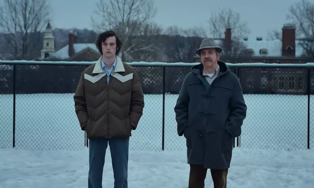 The Holdovers: Dominic Sessa stars as Angus Tully and Paul Giamatti as Paul Hunham in director Alexander Payne’s THE HOLDOVERS, a Focus Features release.Credit: Courtesy of FOCUS FEATURES / © 2023 FOCUS FEATURES LLC