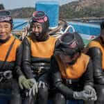 Haenyeo divers of South Korea’s Jeju Island in “The Last of the Sea Women,” premiering October 11, 2024 on Apple TV+.