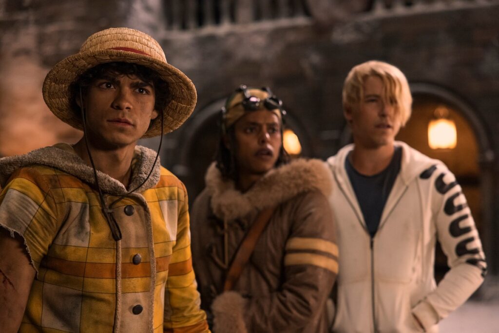 Iñaki Godoy as Monkey D. Luffy, Taz Skylar as Sanji, and Jacob Romero as Usopp in in Netflix's One Piece (Photography by Casey Crafford / Netflix)