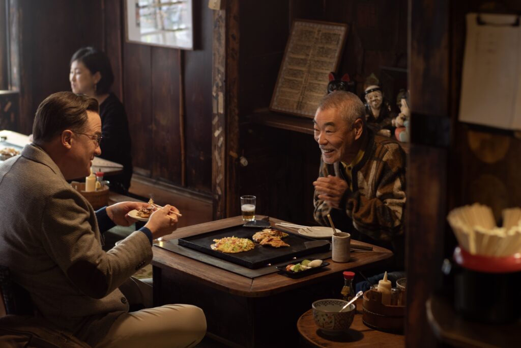 Brendan Fraser and Akira Emoto in Rental Family (Photo Credit: James Lisle/Searchlight Pictures) © 2025 Searchlight Pictures. All Rights Reserved.