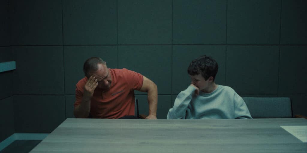 Stephen Graham as Eddie Miller, Owen Cooper as Jamie Miller, in police interrogation room in Adolescence