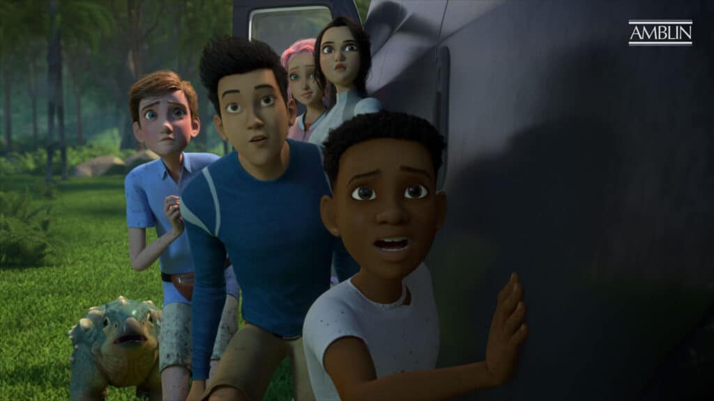 Kids in Jurassic World: Camp Cretaceous hiding behind vehicle with a dinosaur. Photo Credit (DreamWorks Animation / Amblin Entertainment)